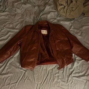 Berman’s brown leather jacket